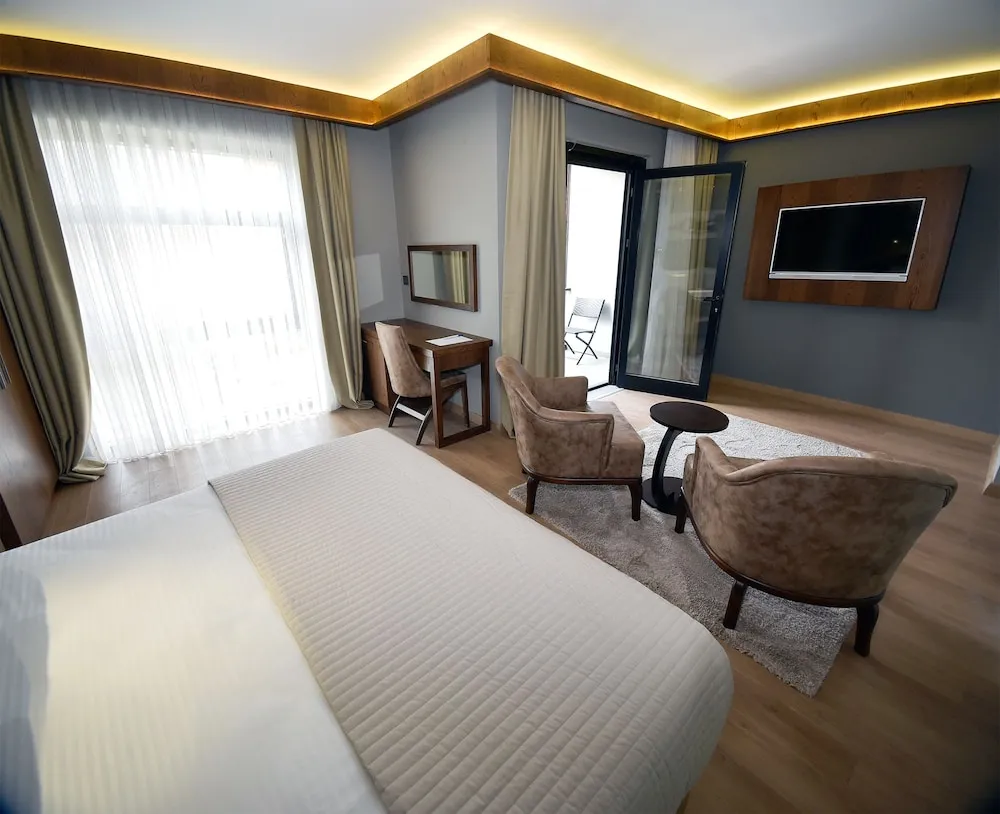 Deluxe Tek Büyük veya İki Ayrı Yataklı Oda, Balkon