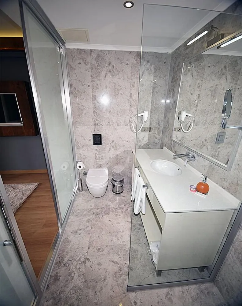 Deluxe Tek Büyük veya İki Ayrı Yataklı Oda, Balkon