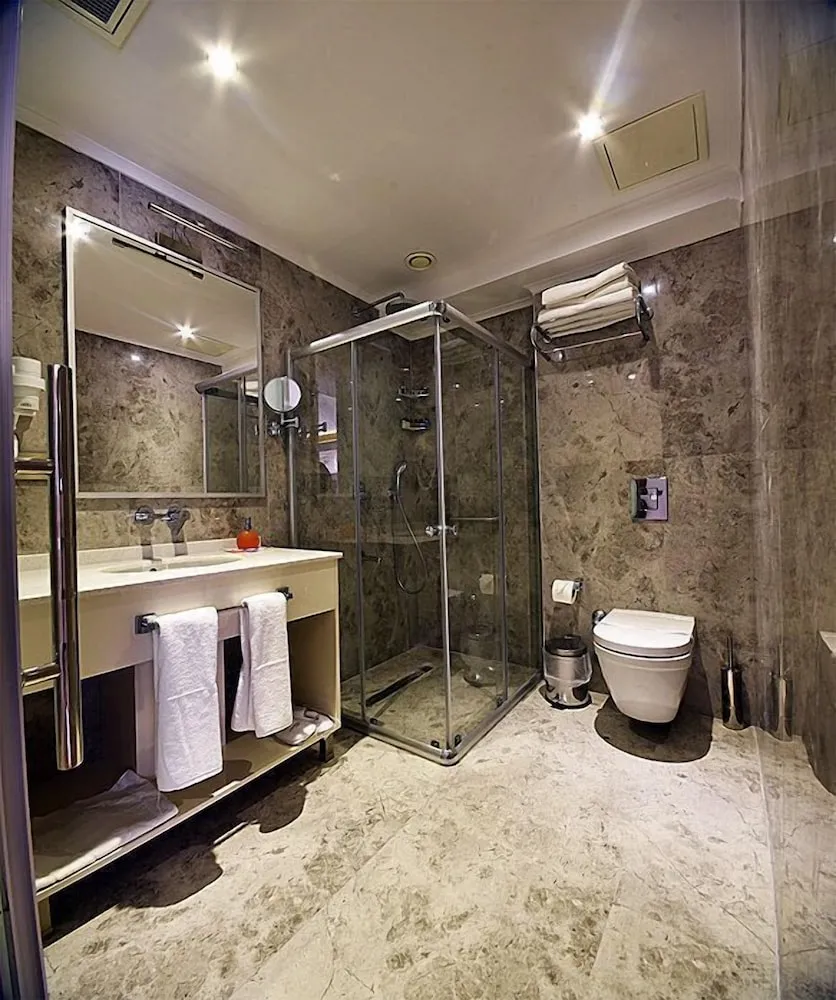 Deluxe Tek Büyük veya İki Ayrı Yataklı Oda, Balkon