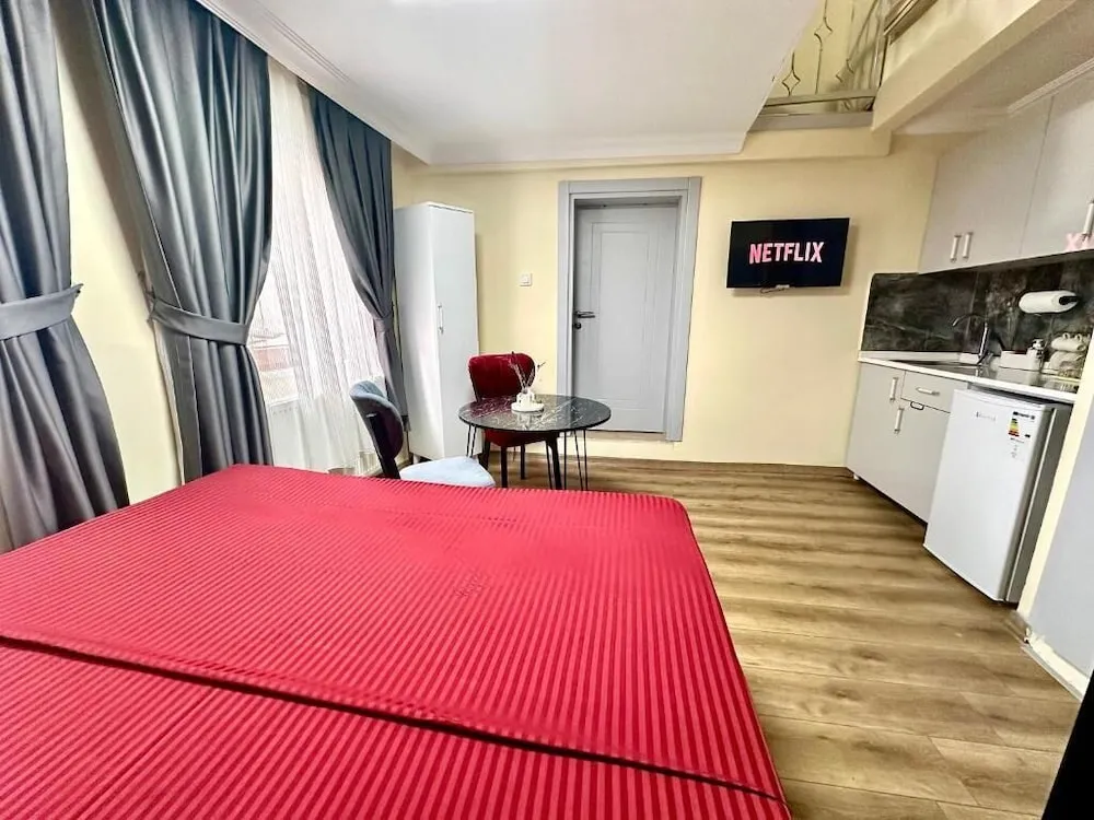Deluxe Dört Kişilik Oda
