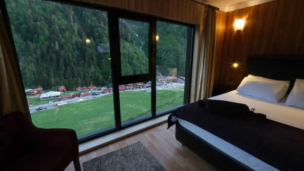 Deluxe, Fireplace, Waterfall View