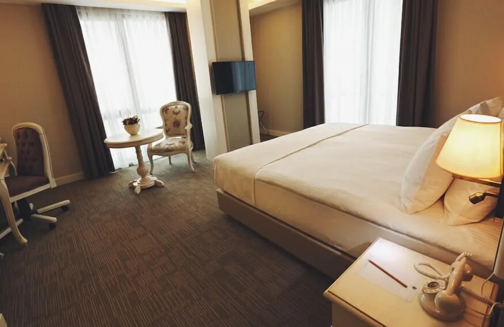 Deluxe Üç Kişilik Oda, Deniz Manzaralı