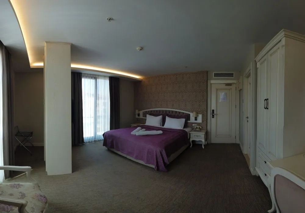 Deluxe Üç Kişilik Oda, Deniz Manzaralı