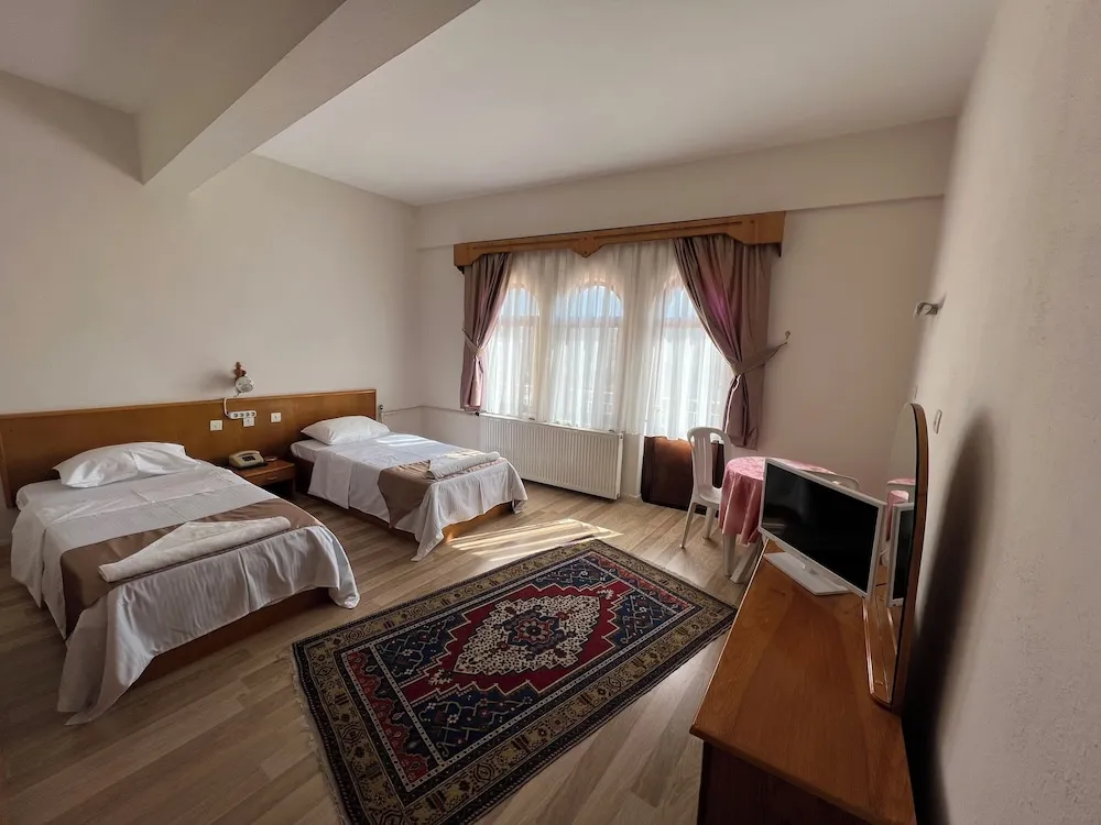 Deluxe Tek Büyük veya İki Ayrı Yataklı Oda, Balkon