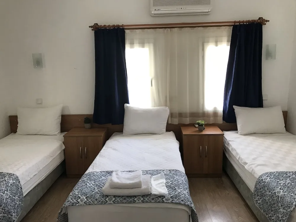Üç Kişilik Oda