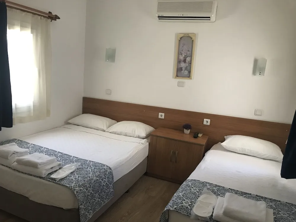Üç Kişilik Oda