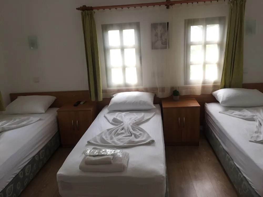 Üç Kişilik Oda