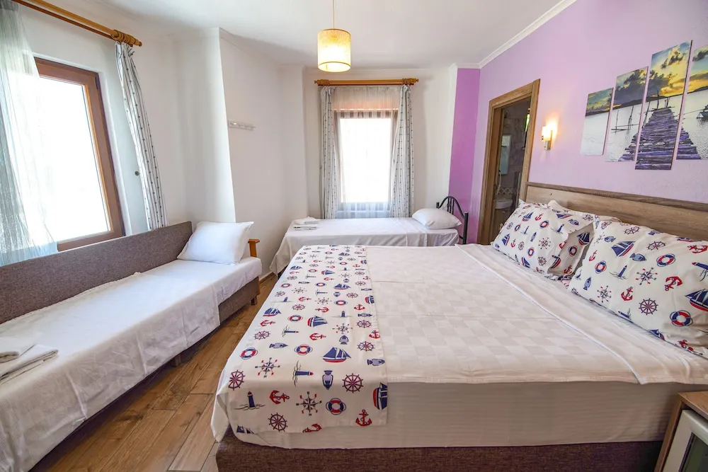 Deluxe Dört Kişilik Oda