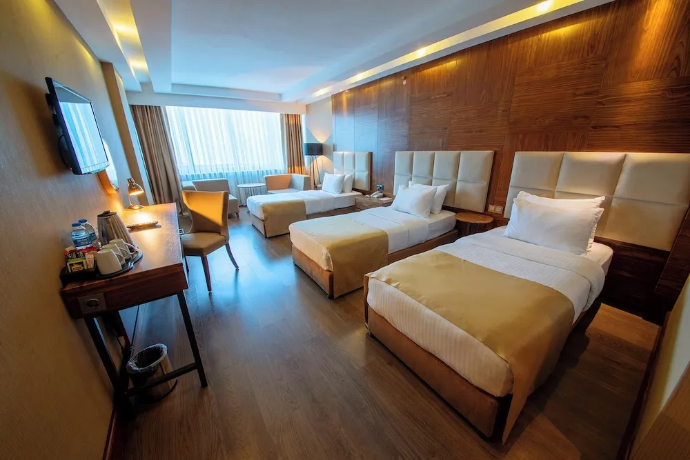 Deluxe Üç Kişilik Oda