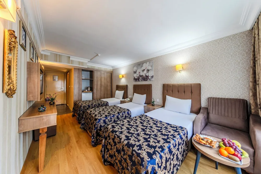 Deluxe Üç Kişilik Oda