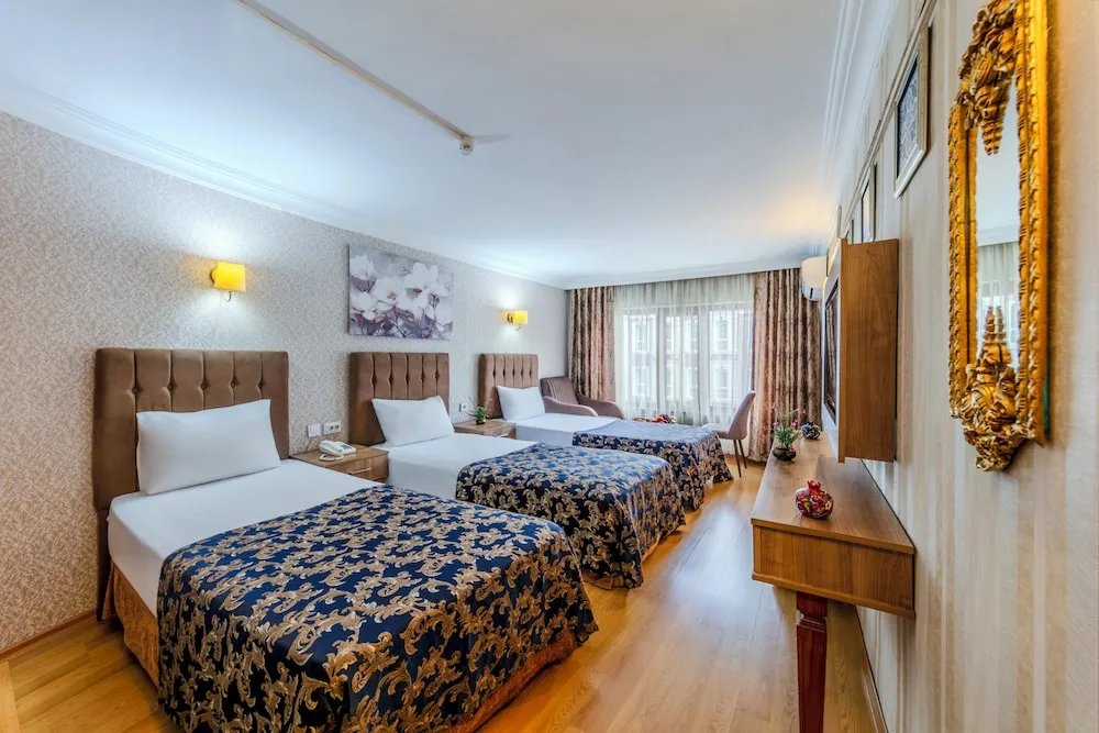 Deluxe Üç Kişilik Oda