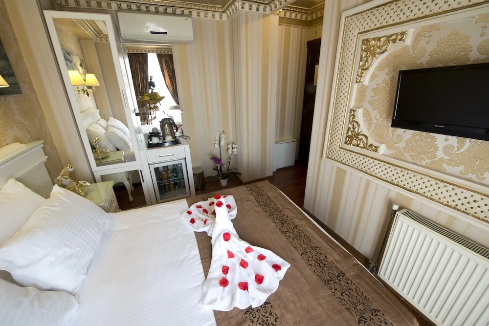 Deluxe Tek Büyük veya İki Ayrı Yataklı Oda