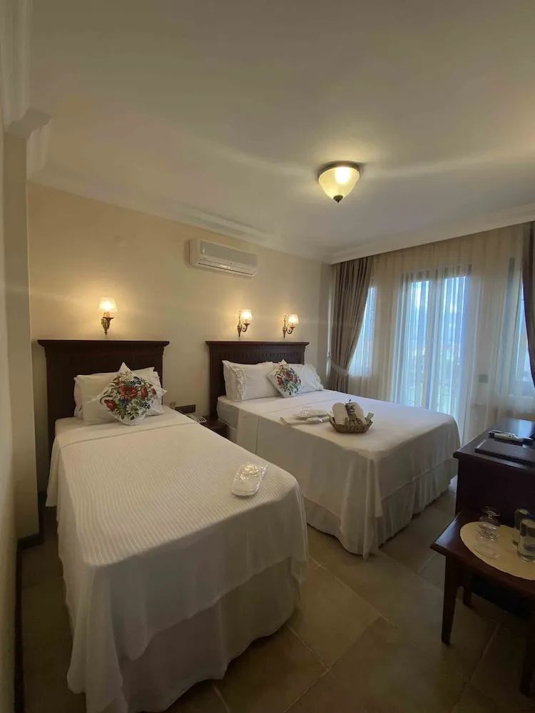 Deluxe Üç Kişilik Oda