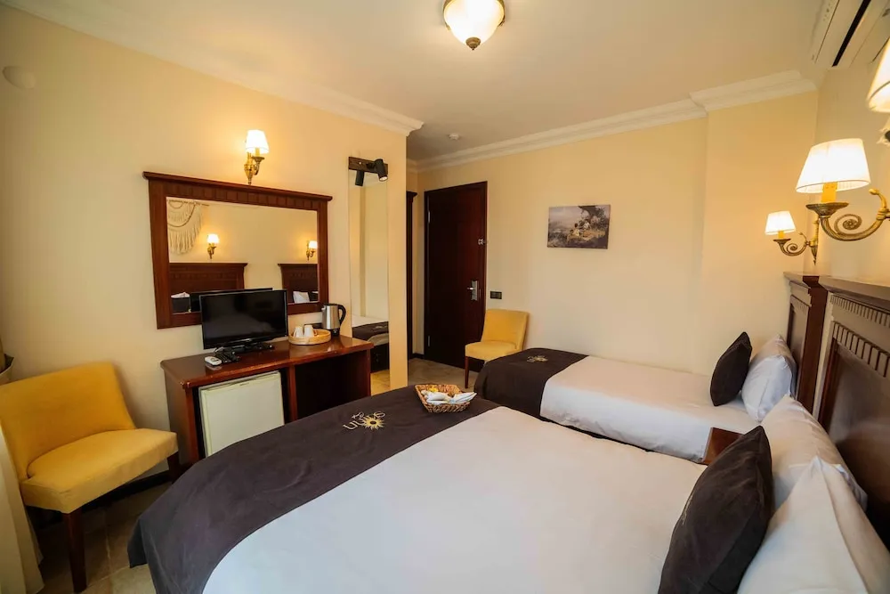 Deluxe Üç Kişilik Oda
