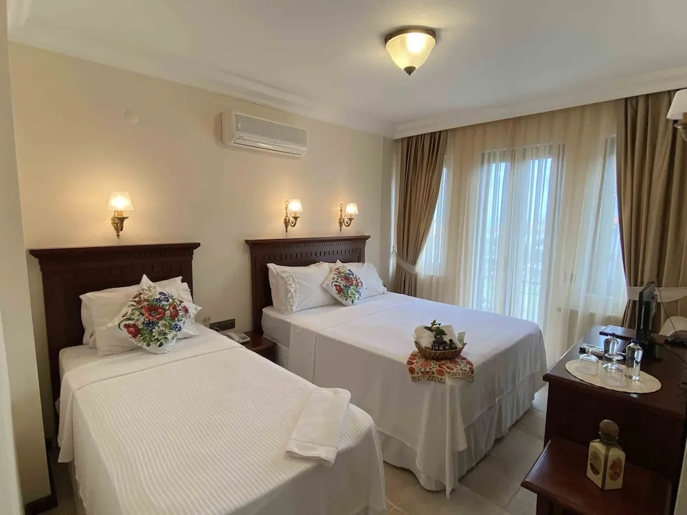 Deluxe Üç Kişilik Oda