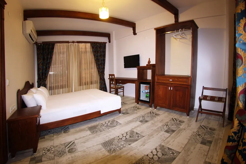 Deluxe Tek Büyük veya İki Ayrı Yataklı Oda