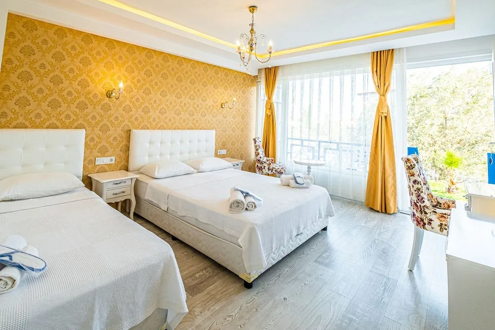 Deluxe Üç Kişilik Oda