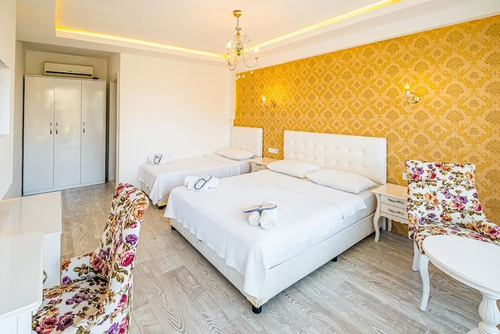 Deluxe Üç Kişilik Oda