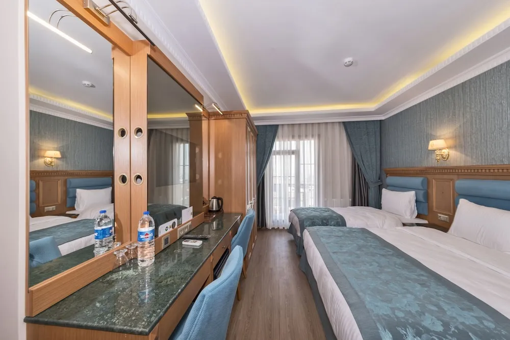Deluxe Üç Kişilik Oda