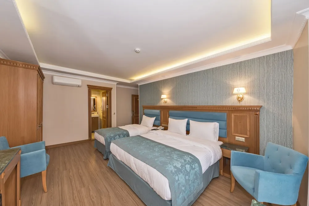 Deluxe Üç Kişilik Oda