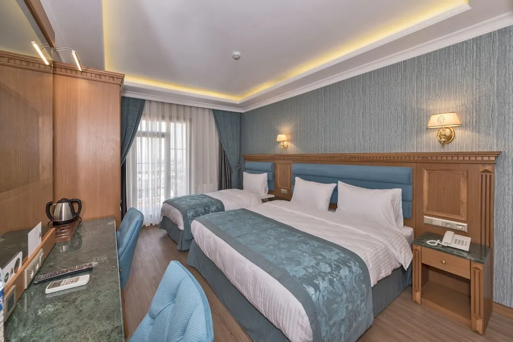 Deluxe Üç Kişilik Oda