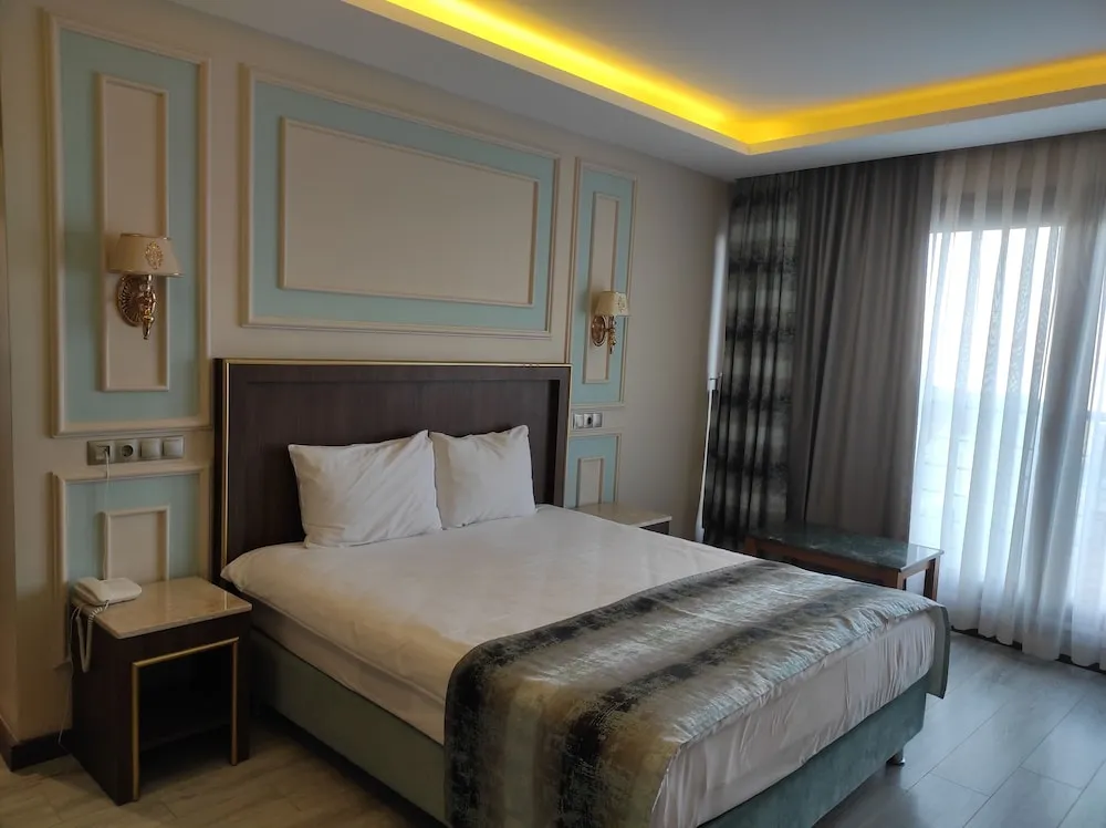 Deluxe Tek Büyük Yataklı Oda, Balkon, Deniz Manzaralı