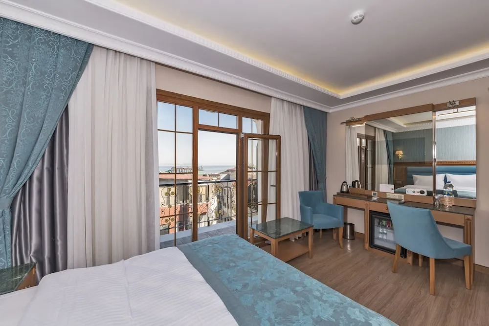 Deluxe Tek Büyük Yataklı Oda, Balkon, Deniz Manzaralı