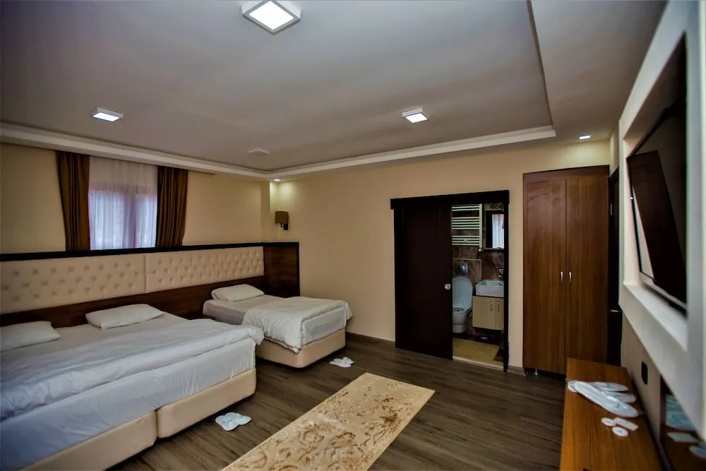 Deluxe Üç Kişilik Oda