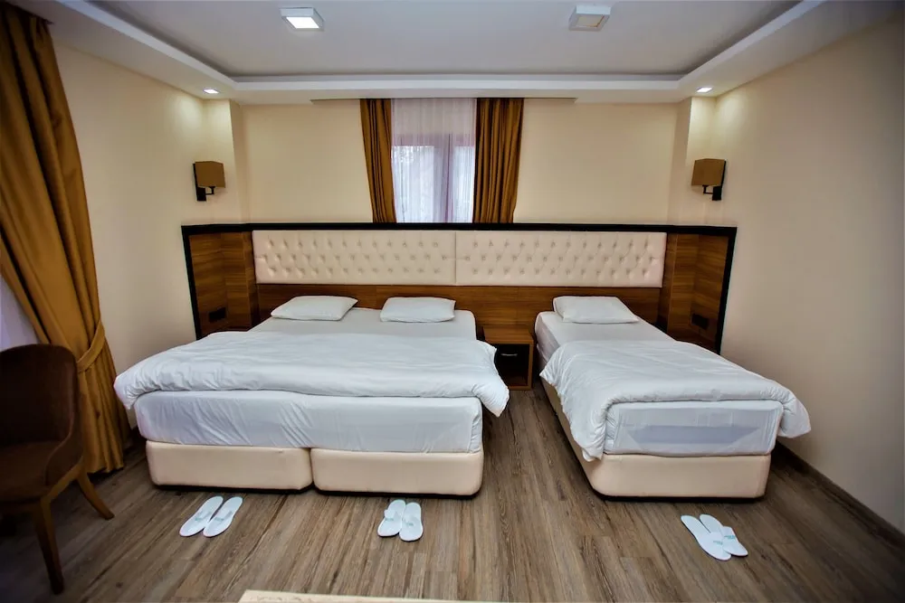 Deluxe Üç Kişilik Oda