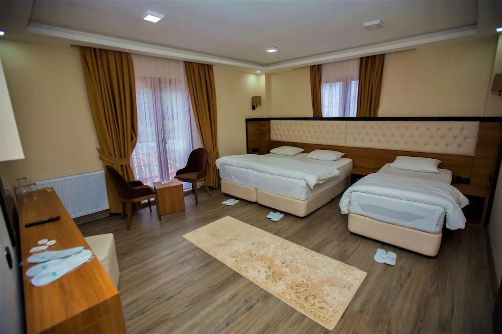 Deluxe Üç Kişilik Oda
