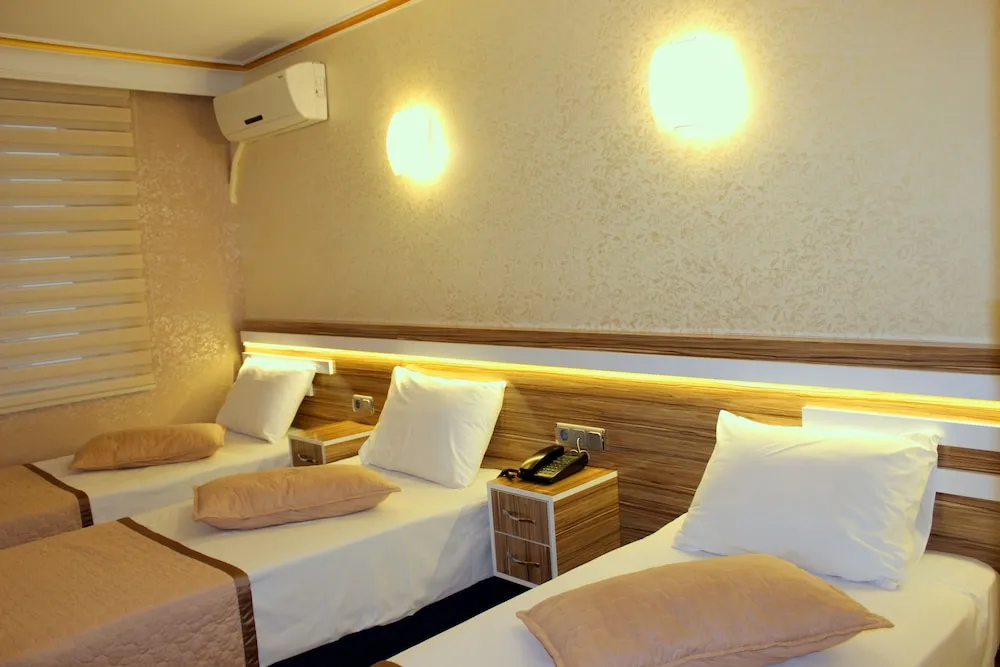 Deluxe Üç Kişilik Oda