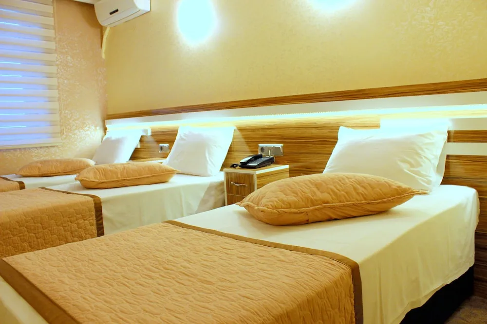 Deluxe Üç Kişilik Oda