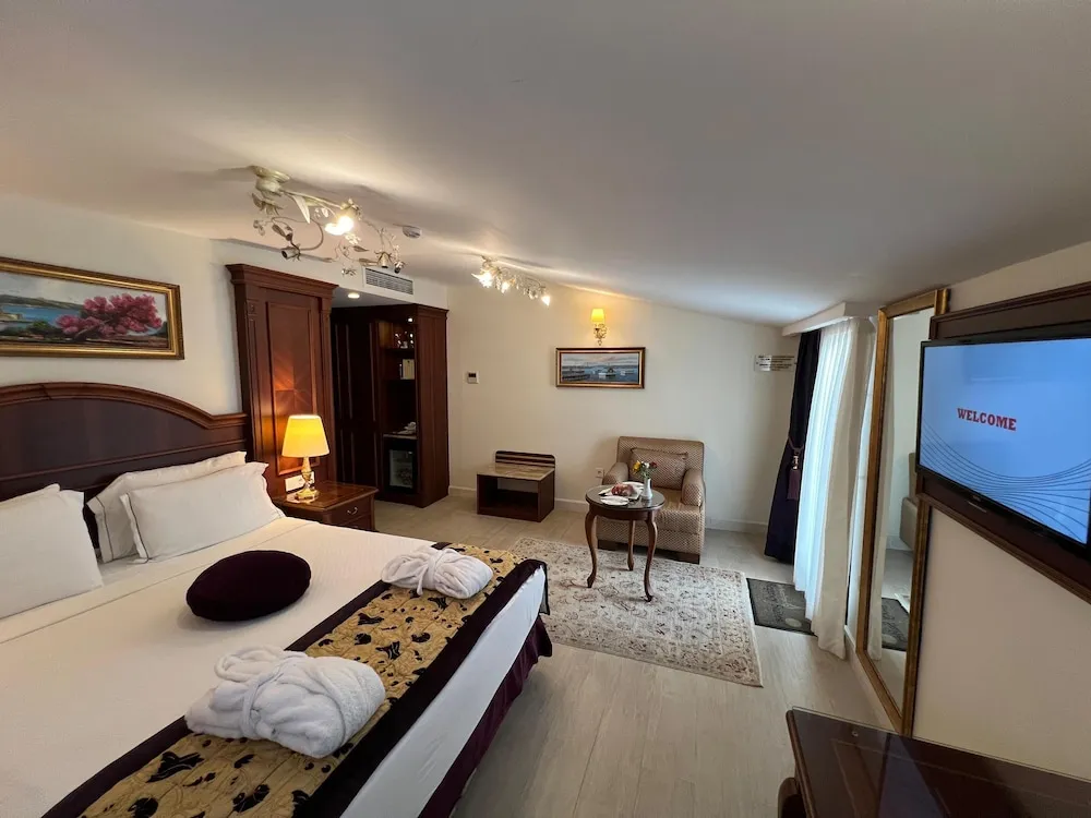 Deluxe Tek Büyük veya İki Ayrı Yataklı Oda