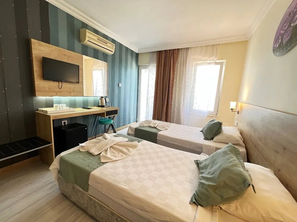 Comfort Tek Büyük veya İki Ayrı Yataklı Oda