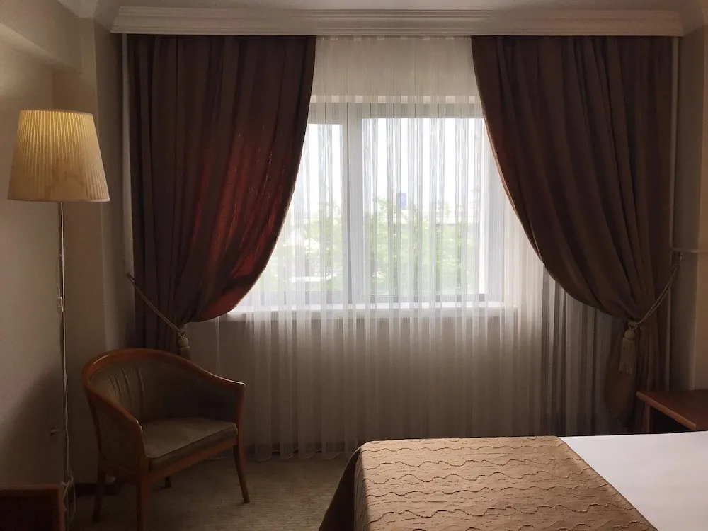 Deluxe Tek Büyük veya İki Ayrı Yataklı Oda