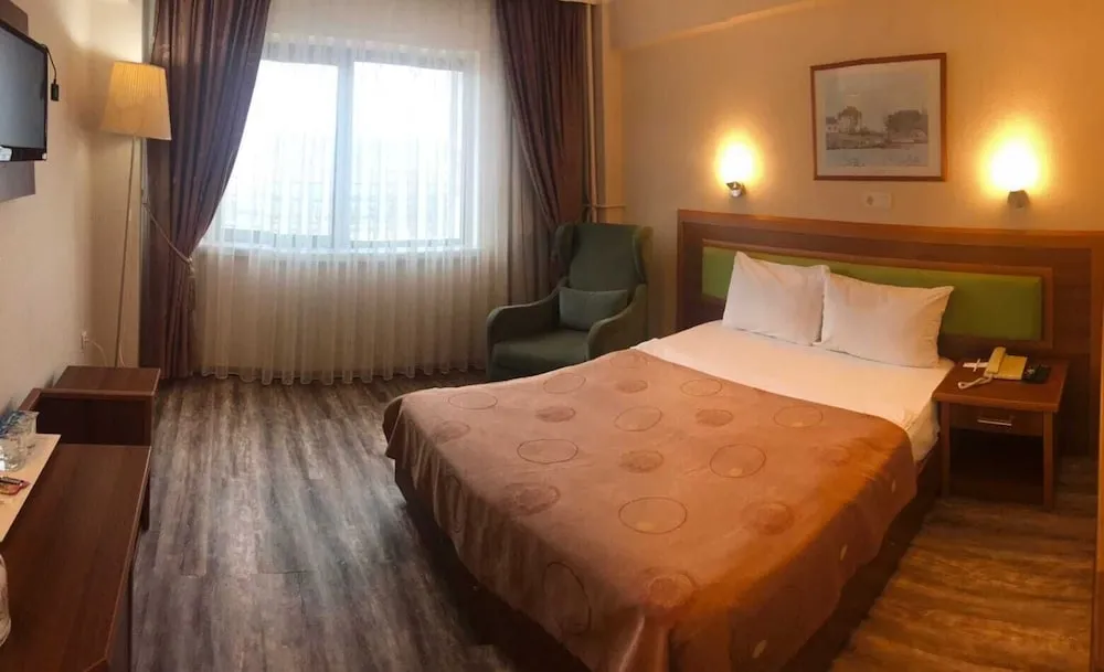 Deluxe Tek Büyük veya İki Ayrı Yataklı Oda