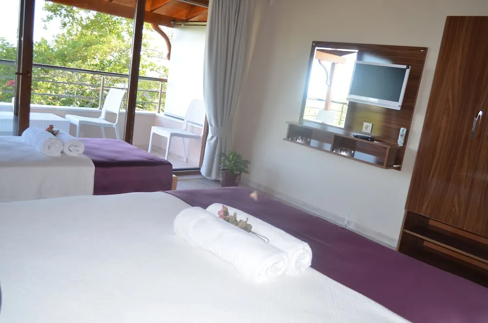 Deluxe Üç Kişilik Oda