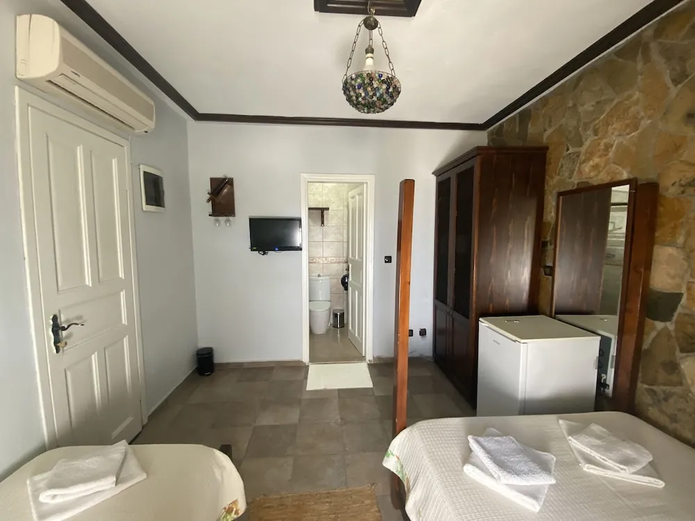 Deluxe Üç Kişilik Oda