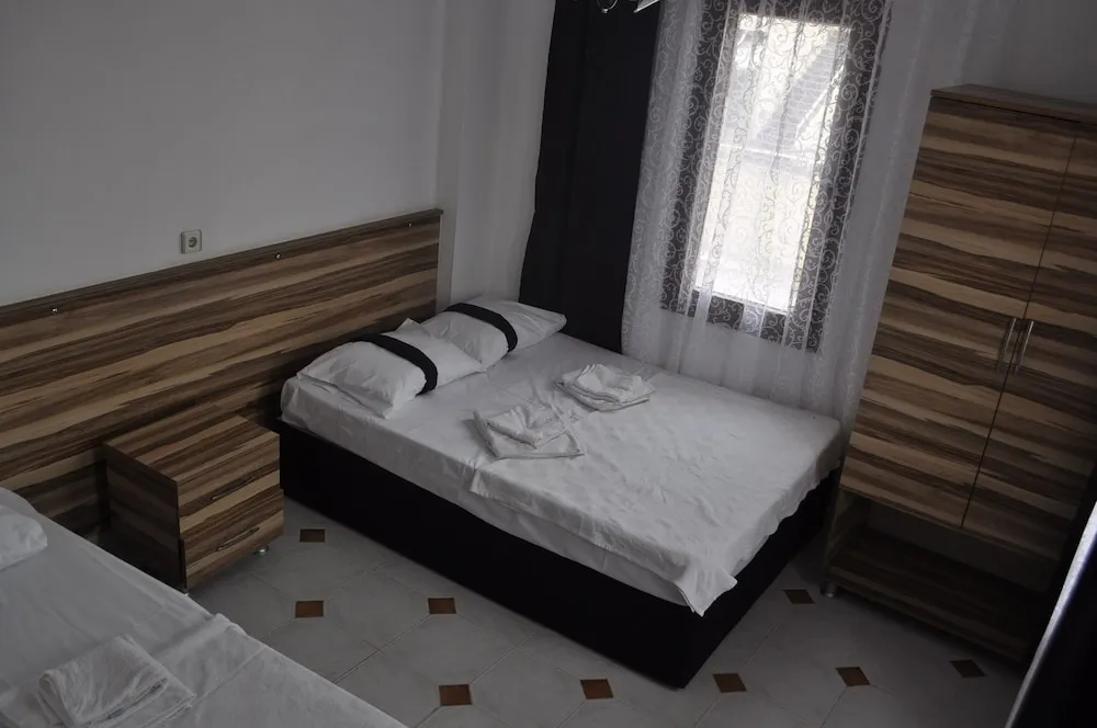 Üç Kişilik Oda