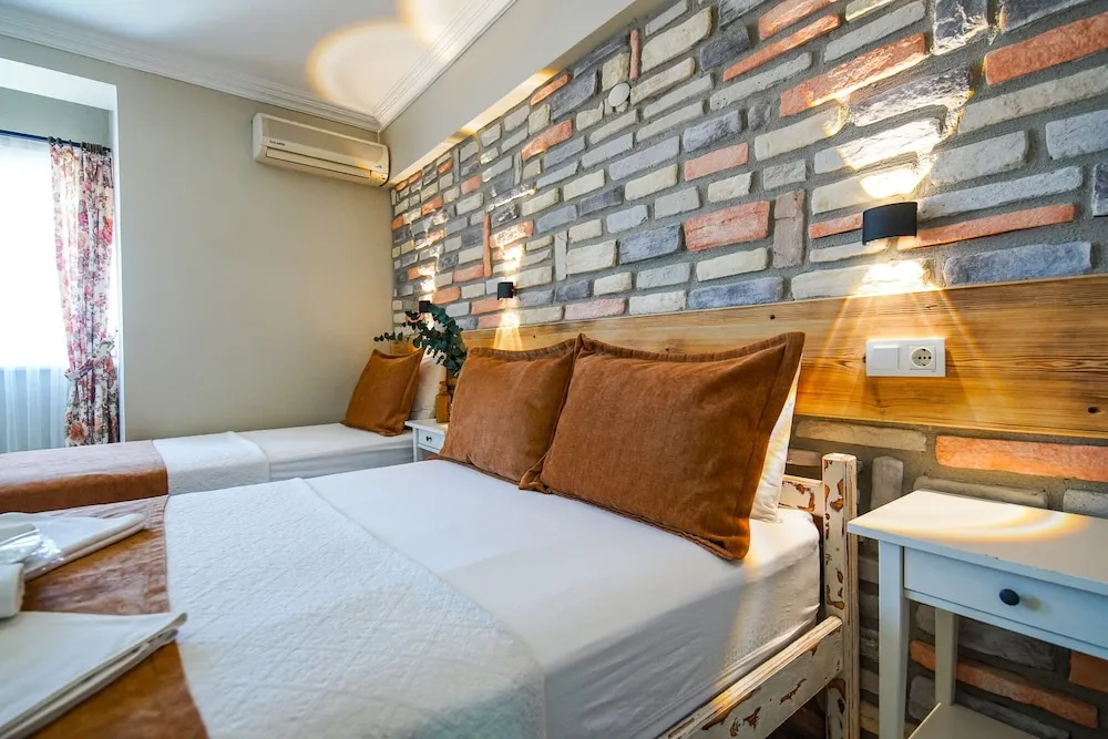 Deluxe Üç Kişilik Oda, Deniz Manzaralı