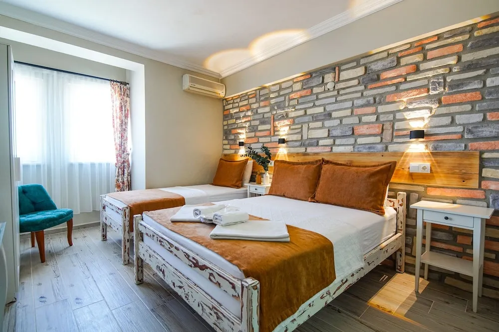 Deluxe Üç Kişilik Oda, Deniz Manzaralı