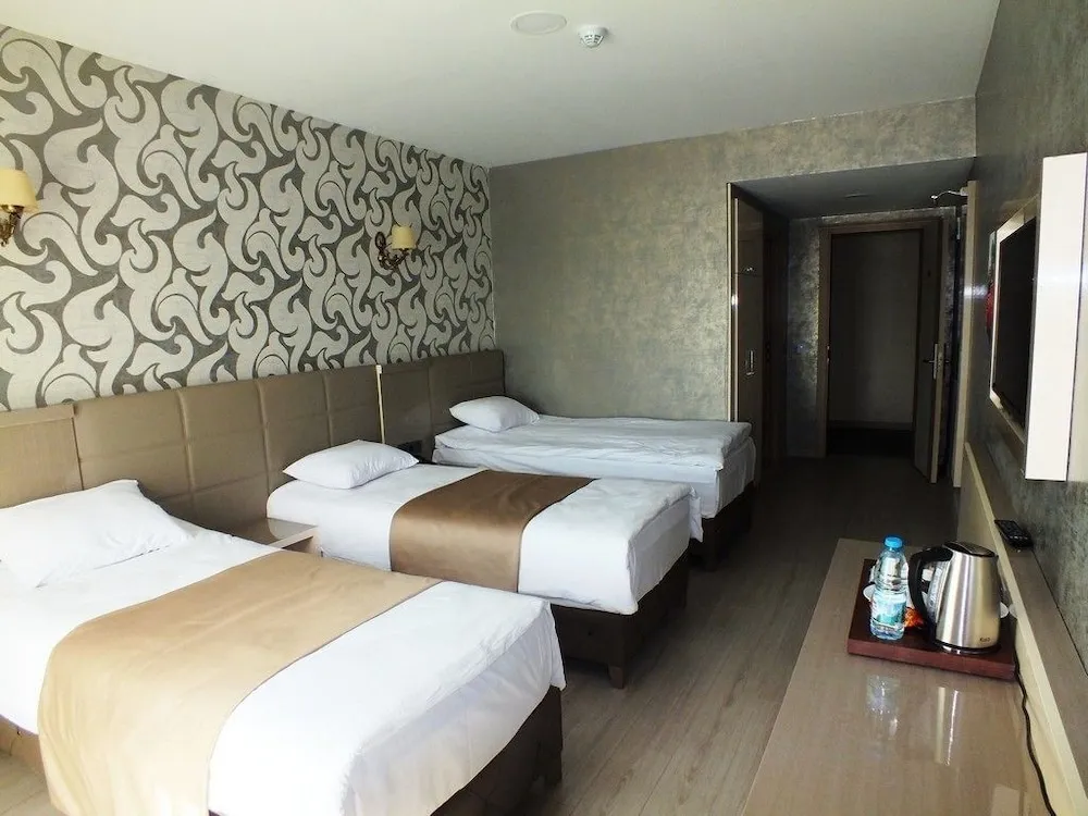Deluxe Üç Kişilik Oda