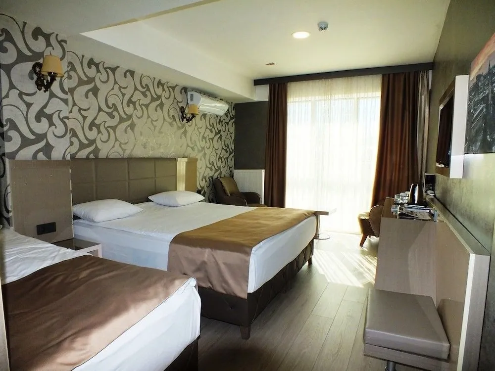 Deluxe Üç Kişilik Oda