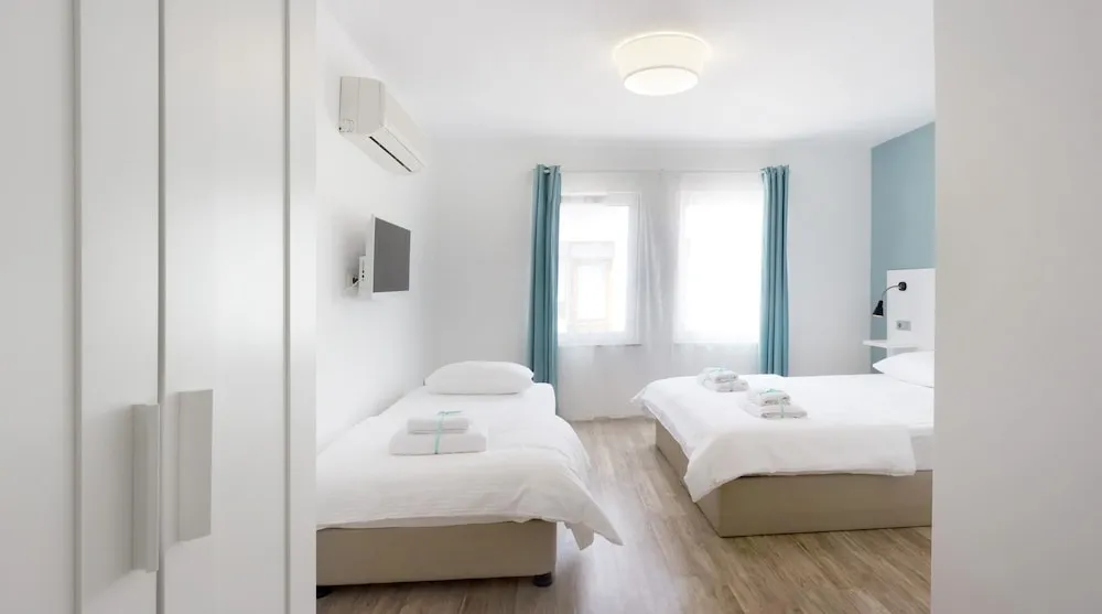 Deluxe Tek Büyük veya İki Ayrı Yataklı Oda