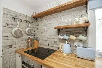 Brunswick Garden Studio Patio by Brighton Holiday Lets