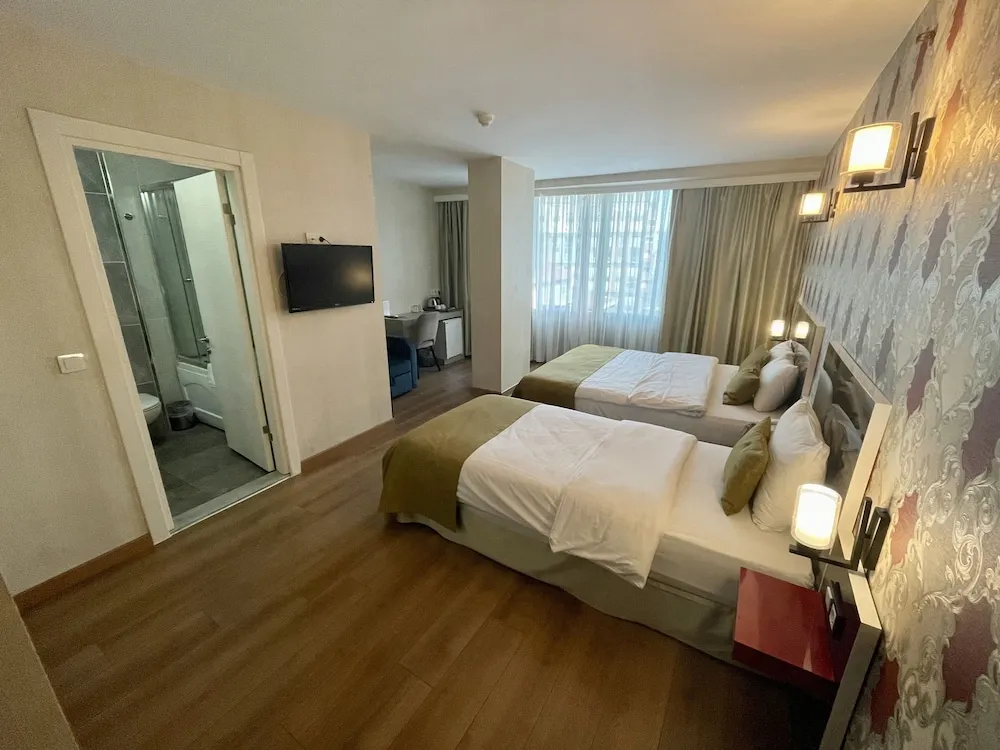 Deluxe Üç Kişilik Oda