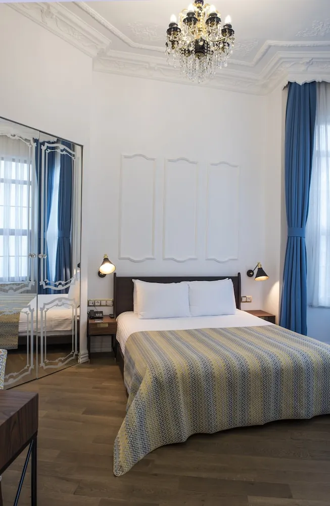 Deluxe Tek Büyük veya İki Ayrı Yataklı Oda