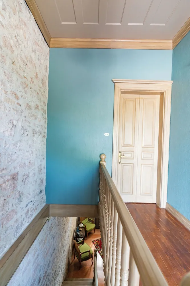 Elia Antique Suit Room