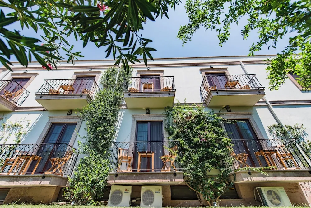 Deluxe Tek Büyük veya İki Ayrı Yataklı Oda, 1 Çift Kişilik veya 2 Tek Kişilik Yatak, Balkon