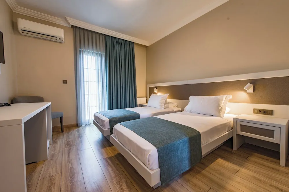 Deluxe Tek Büyük veya İki Ayrı Yataklı Oda, 1 Çift Kişilik veya 2 Tek Kişilik Yatak, Balkon